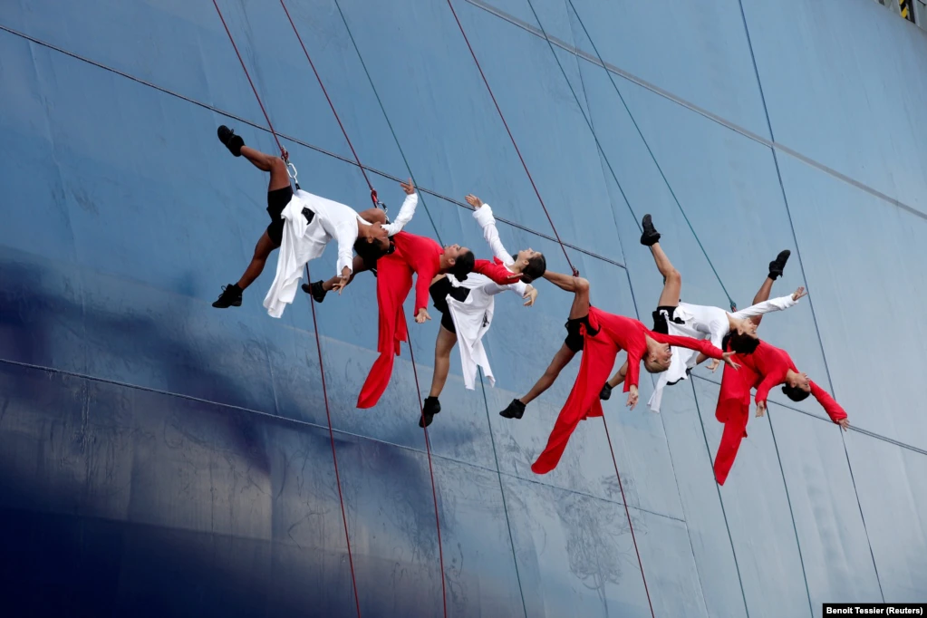 A group of dancers performs during the launch of a container ship in Le Havre, France. (Reuters/Benoit Tessier)