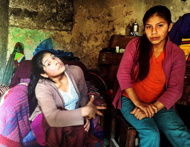 Carmen Rosa (left) and Maria Elena in their small home in Cajamarca, Peru. Credit: Andrea Vale/IPS