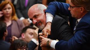Meet the Reporter Dragged from Trump-Putin Press Conference for Trying to Ask About Nuclear Treaty